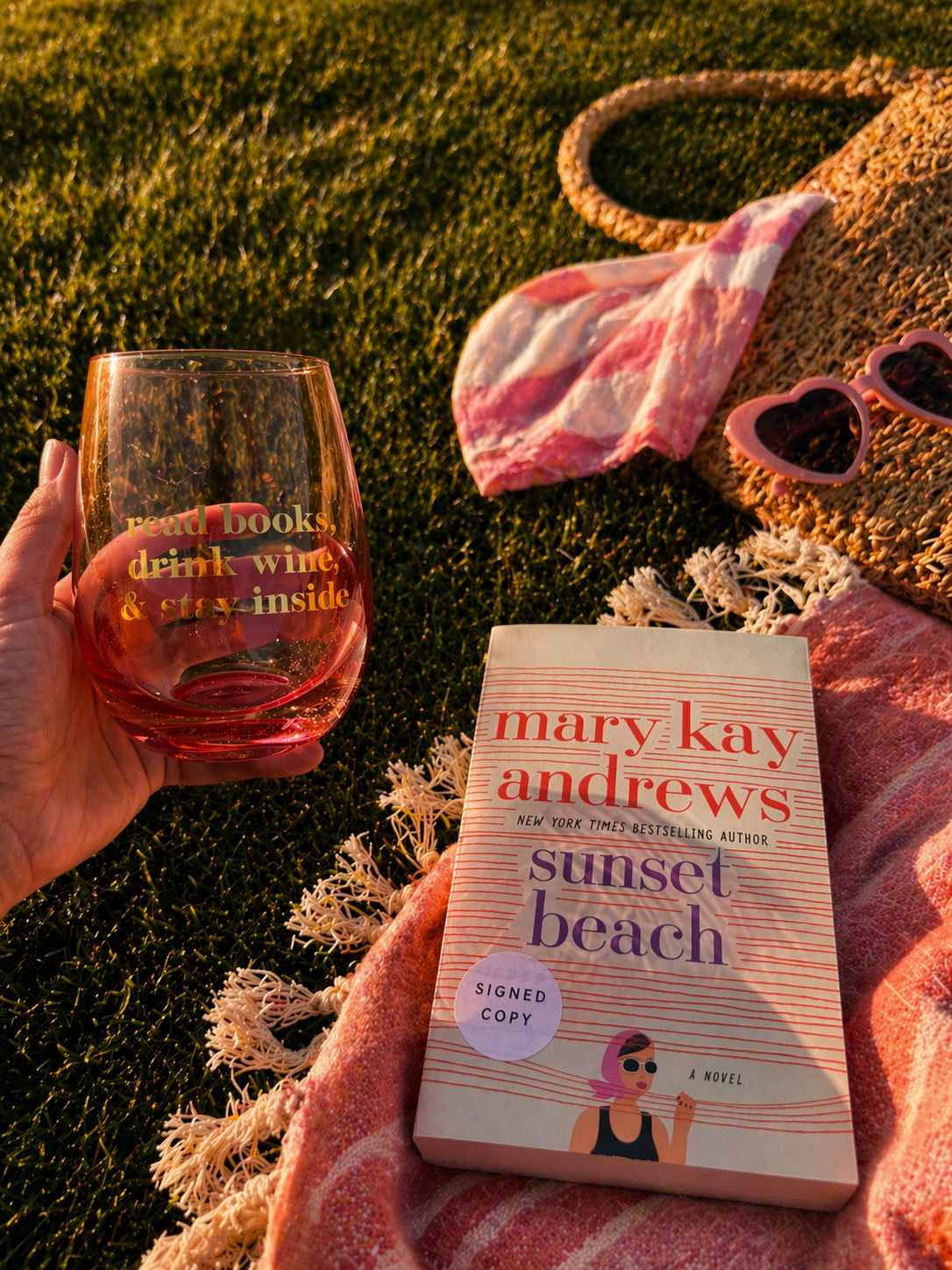 Image of summer wine and book vibes