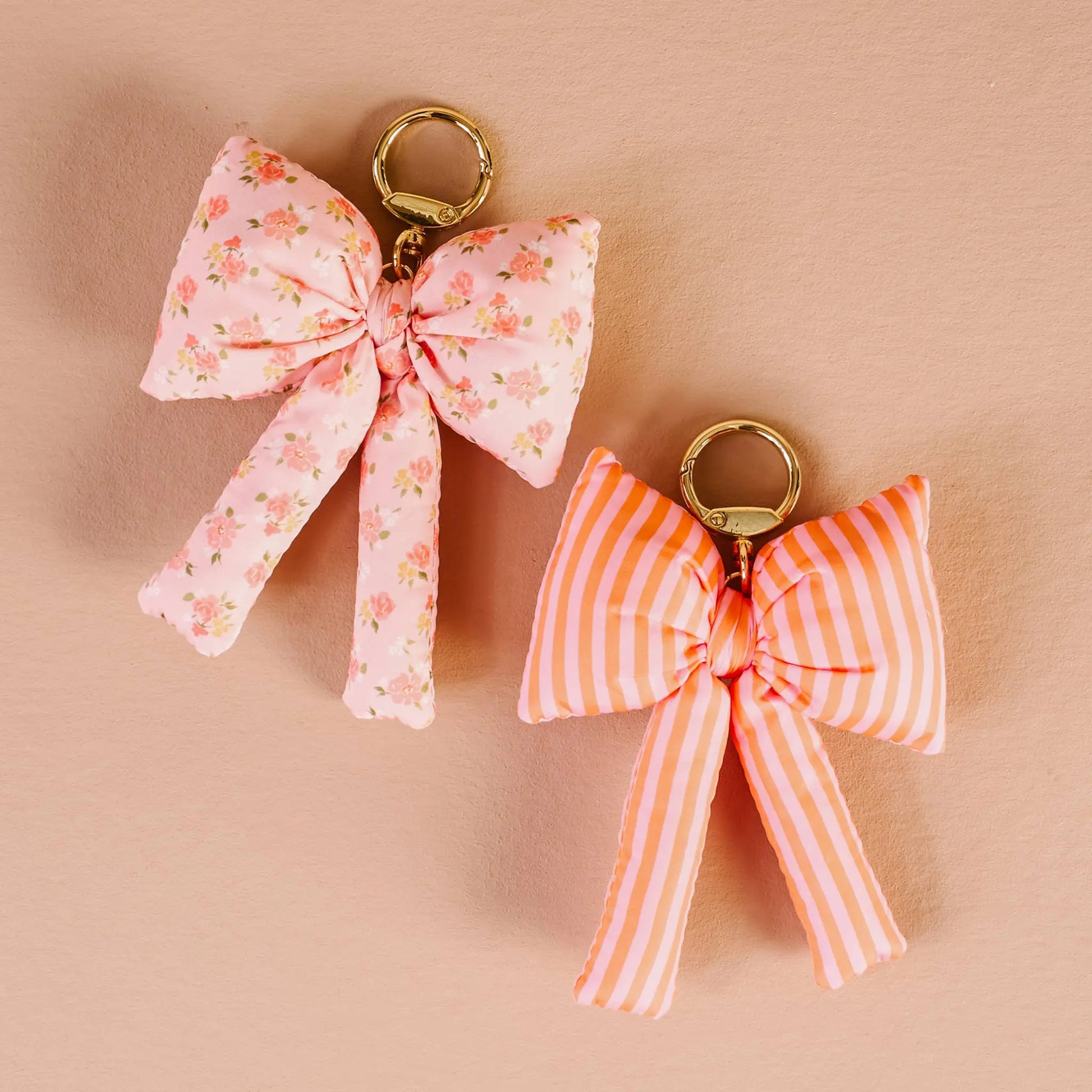 Peachy Petals Puffy Bow Bag Charm in soft pink, luxury satin finish, perfect for purse accessory lovers.