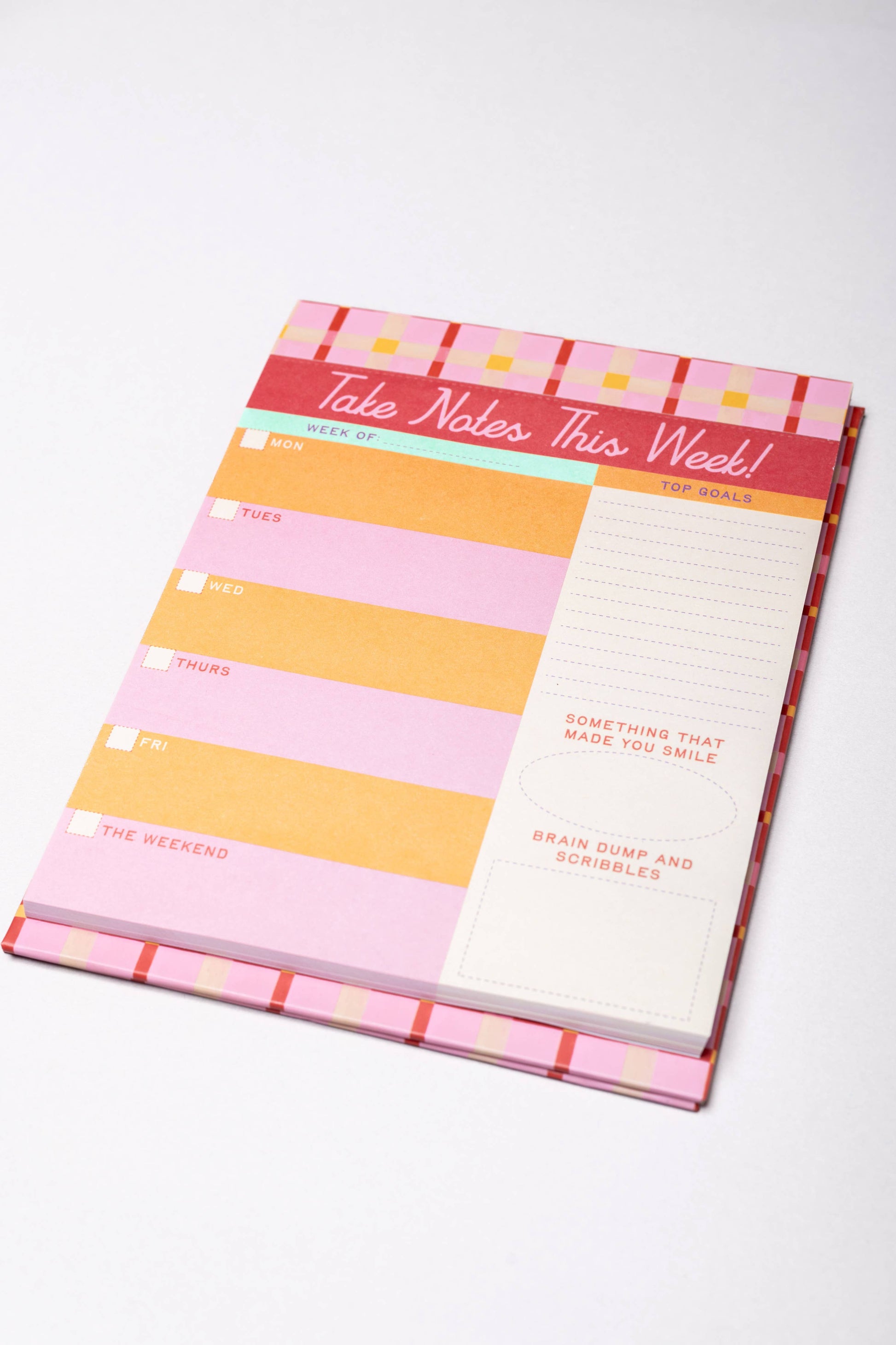 Week to Week Desk Planner: Take Notes This Week with weekly layout, note pages, and daily planning.