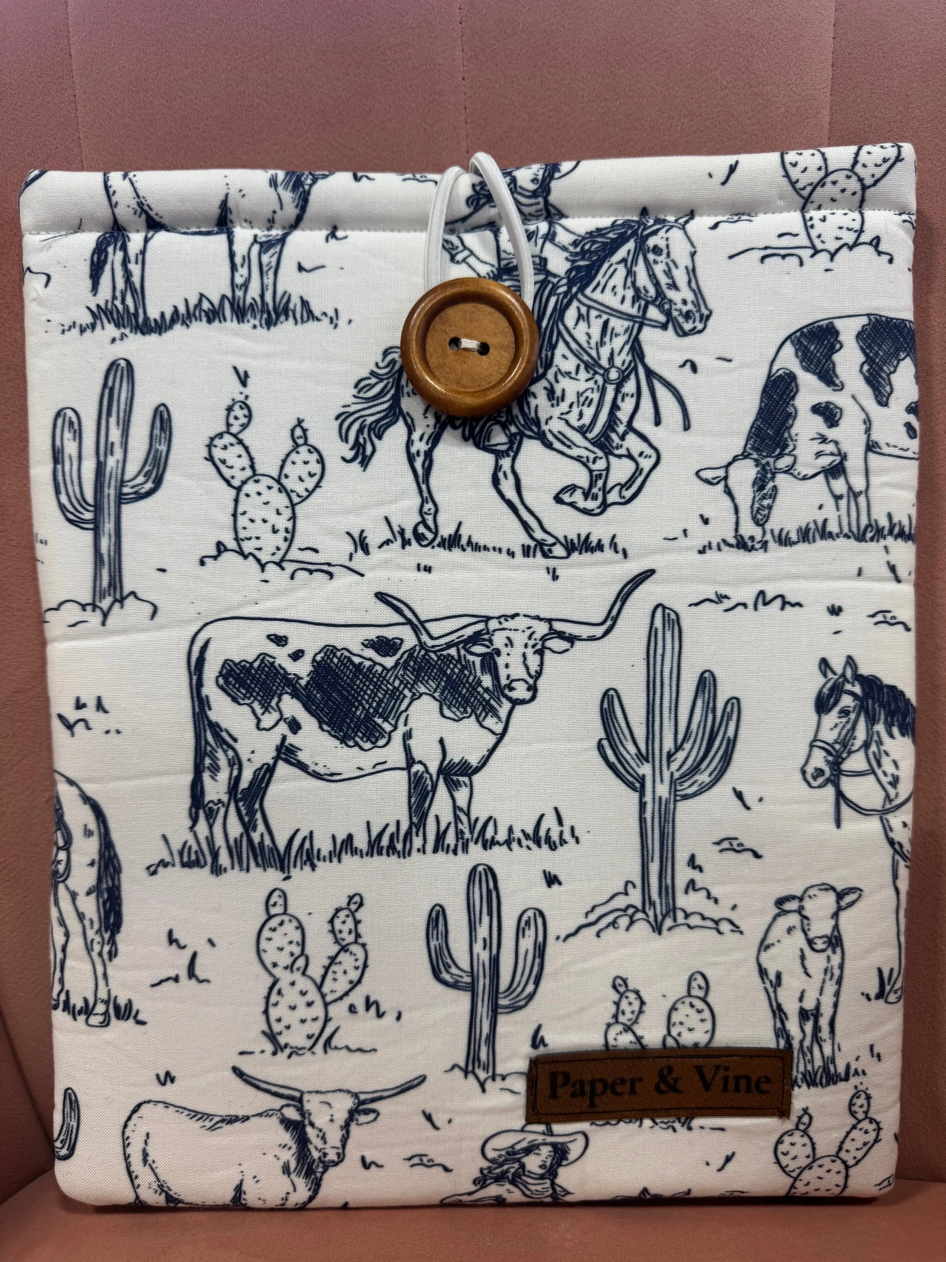 Waterproof Book Sleeve in vibrant floral print, durable neoprene material, fits up to 7-inch tablets and large novels