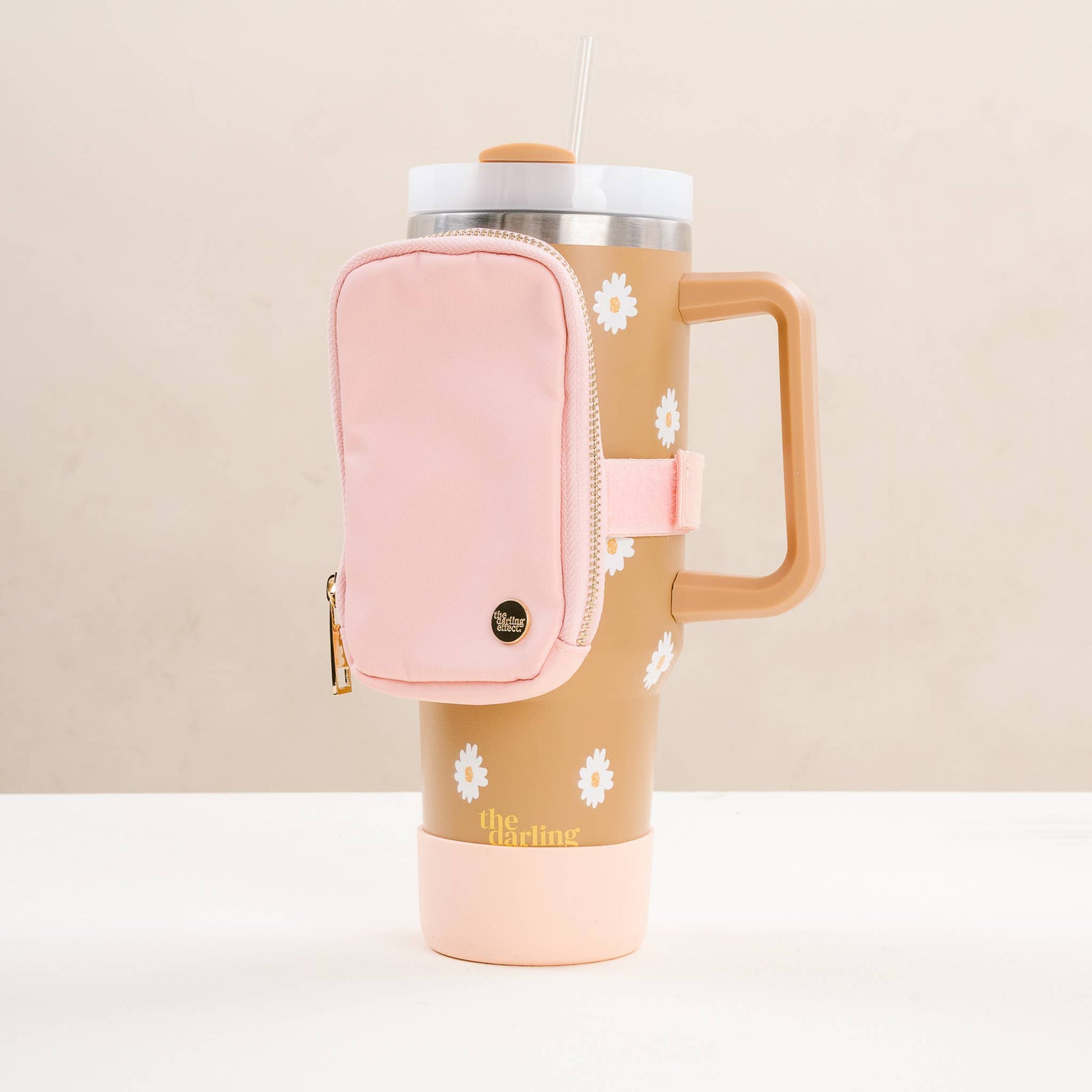 Blush Tumbler Fanny Pack in soft pink, compact size, waterproof nylon for stylish, hands-free carrying