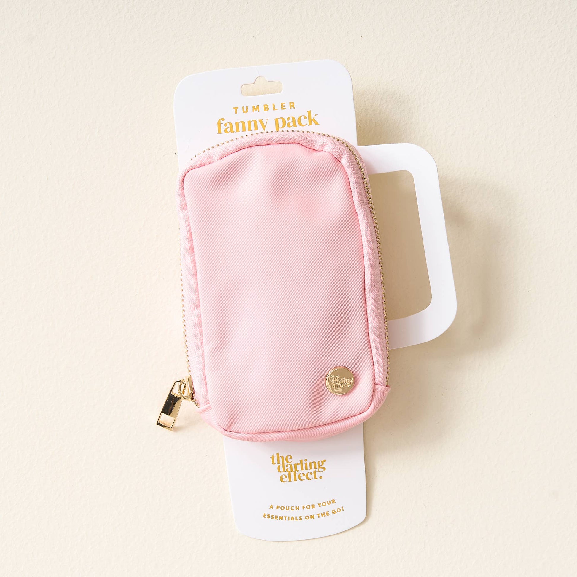 Blush Tumbler Fanny Pack in soft pink, adjustable strap, compact size, perfect for outdoor activities and festivals