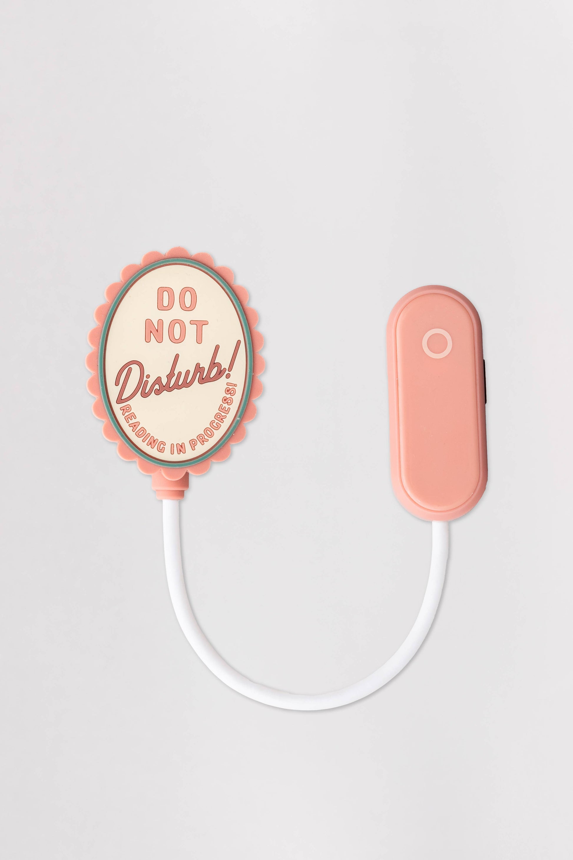 Book Light Do Not Disturb - compact LED reading lamp with adjustable brightness for nighttime reading.