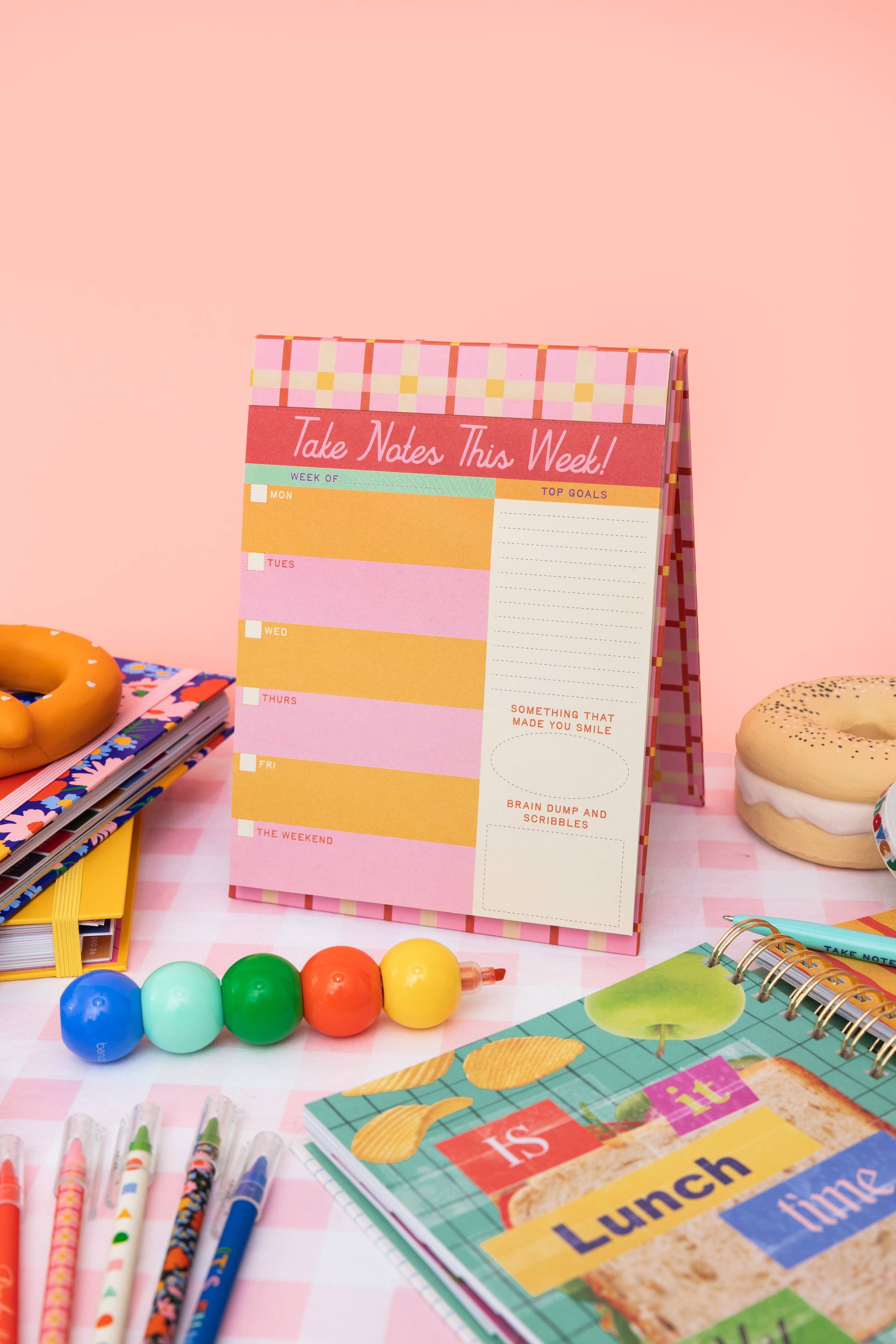 Week to Week Desk Planner with note-taking pages for weekly planning and organization this week.