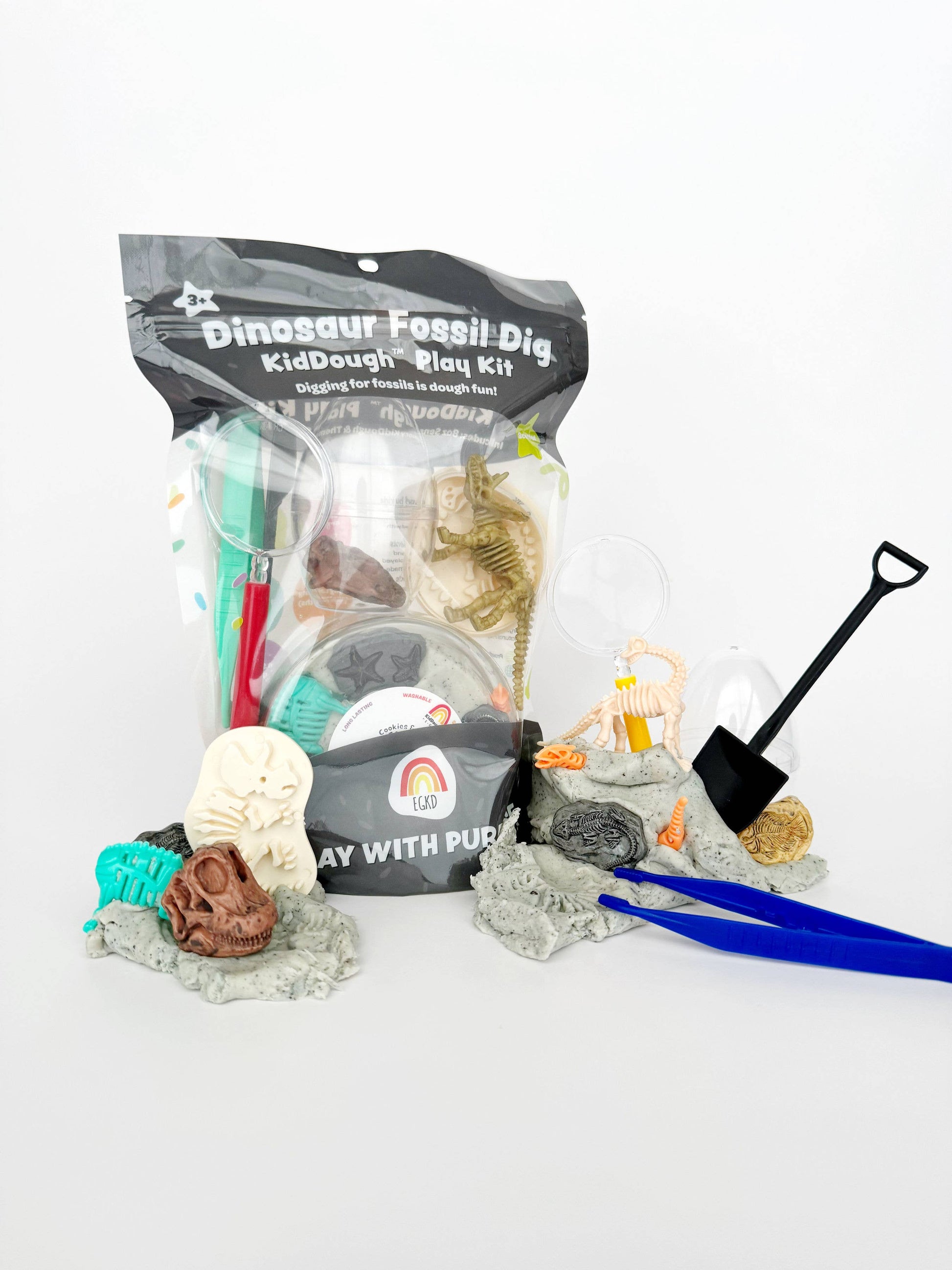 Dinosaur Fossil Dig KidDough Play Kit with realistic clay tools for educational fun, perfect for young paleontologists
