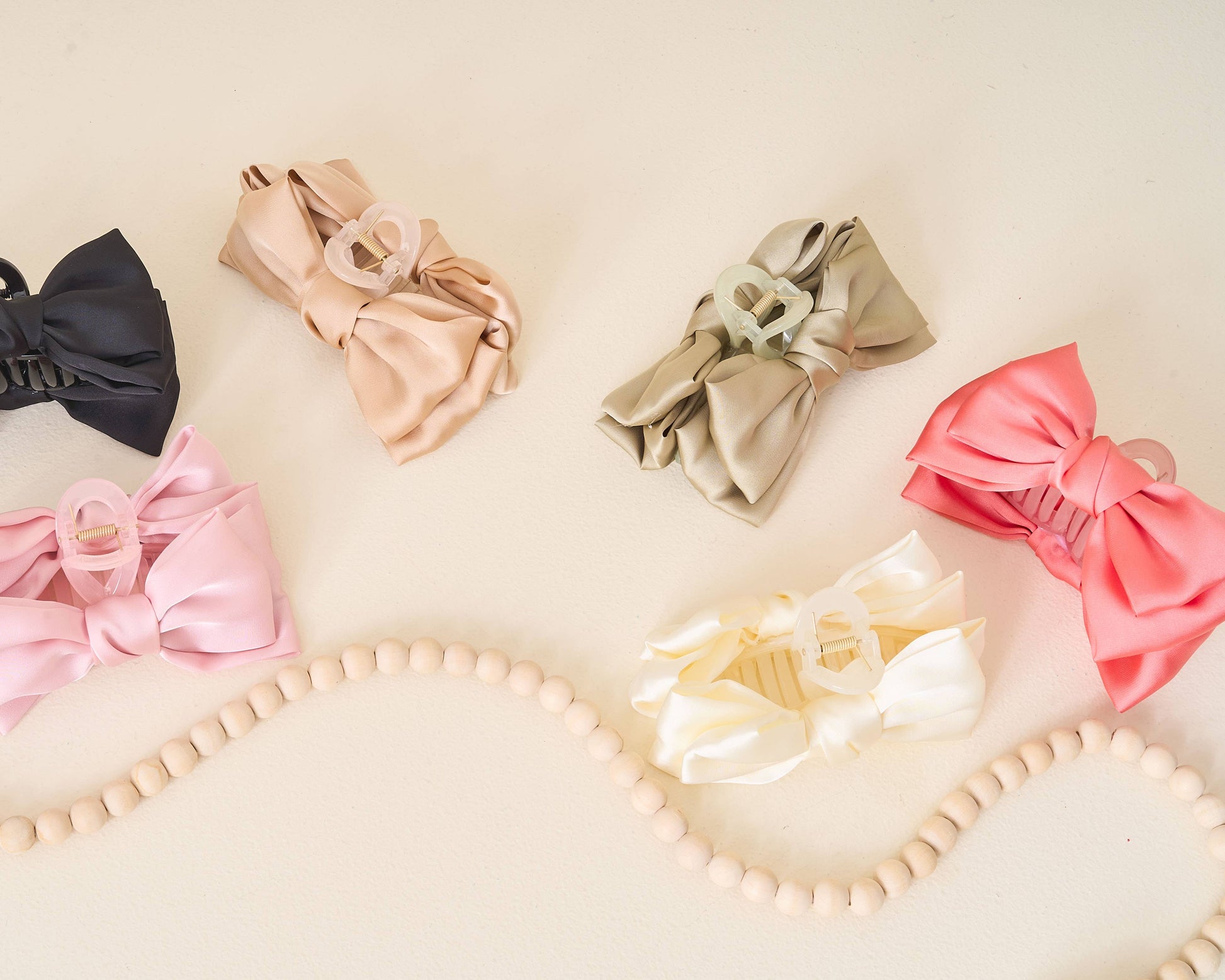 Black Satin Bow Claw Clip for elegant hairstyles, durable hair accessory in sleek design