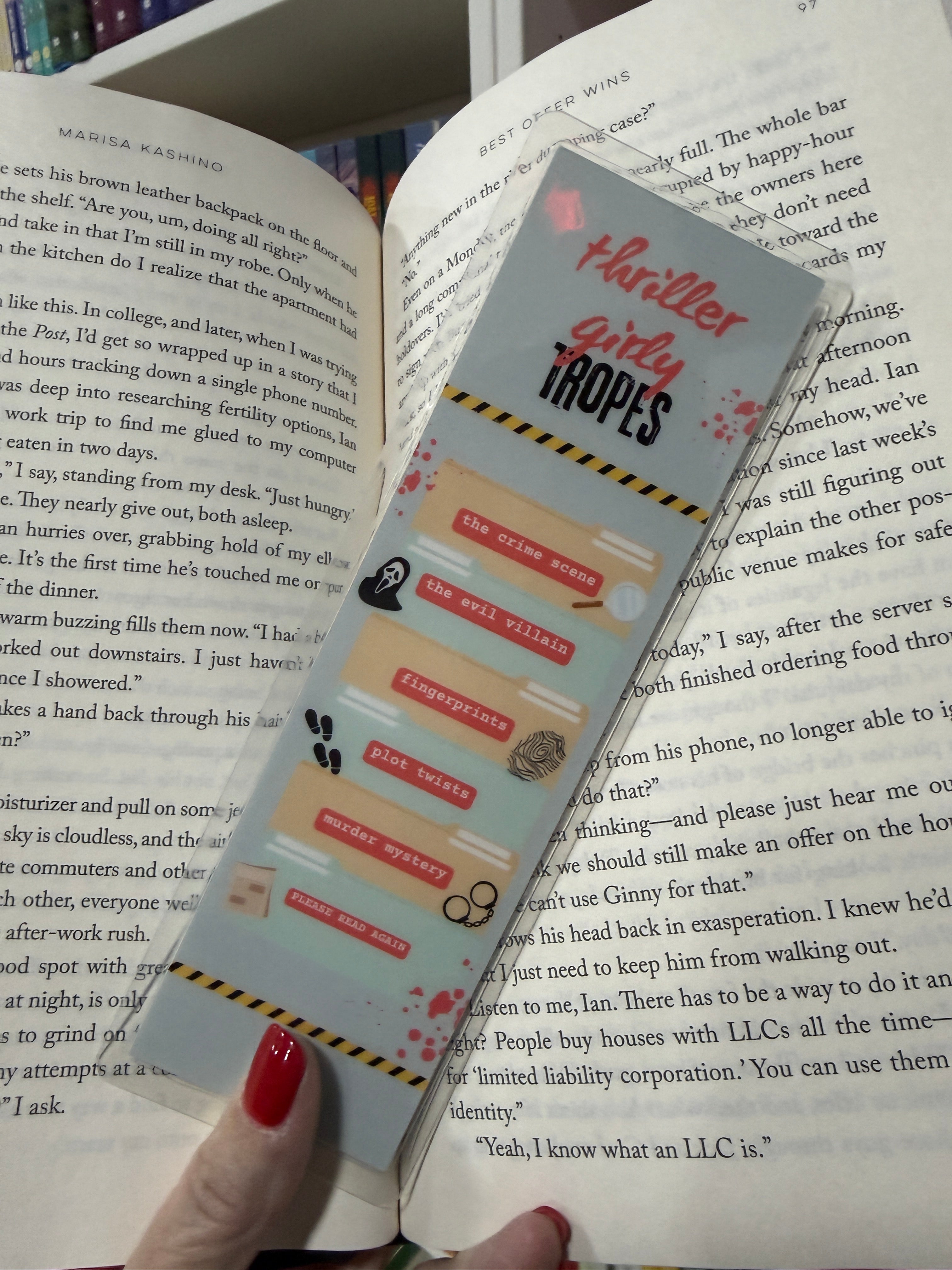 Graphic novel Thriller Girly Tropes, hardcover edition in vibrant pink, featuring strong female leads, 128 pages