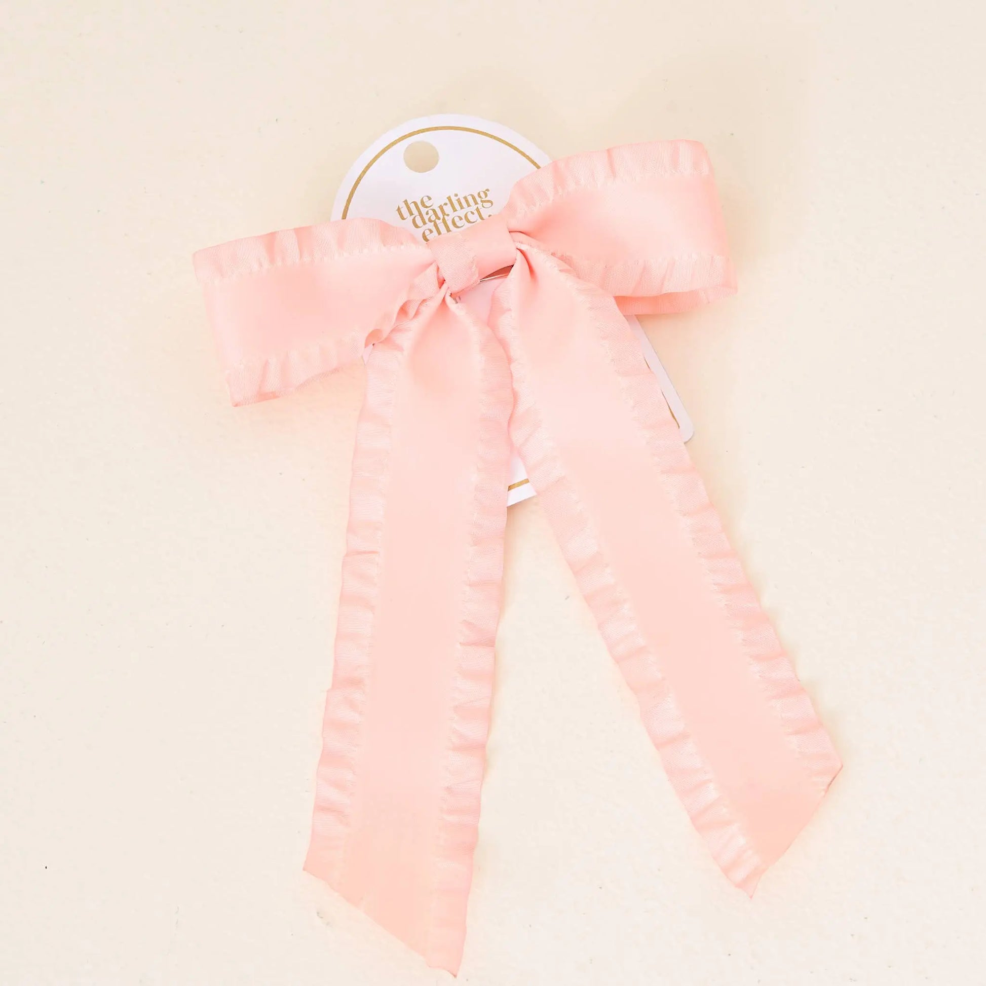Ruffle Hair Bow- Blush: soft pink ribbon accessory with delicate ruffles, perfect for babies and toddlers