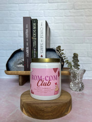 Rom-Com Club vintage-inspired graphic tee in soft pink cotton, size medium, perfect for movie fans