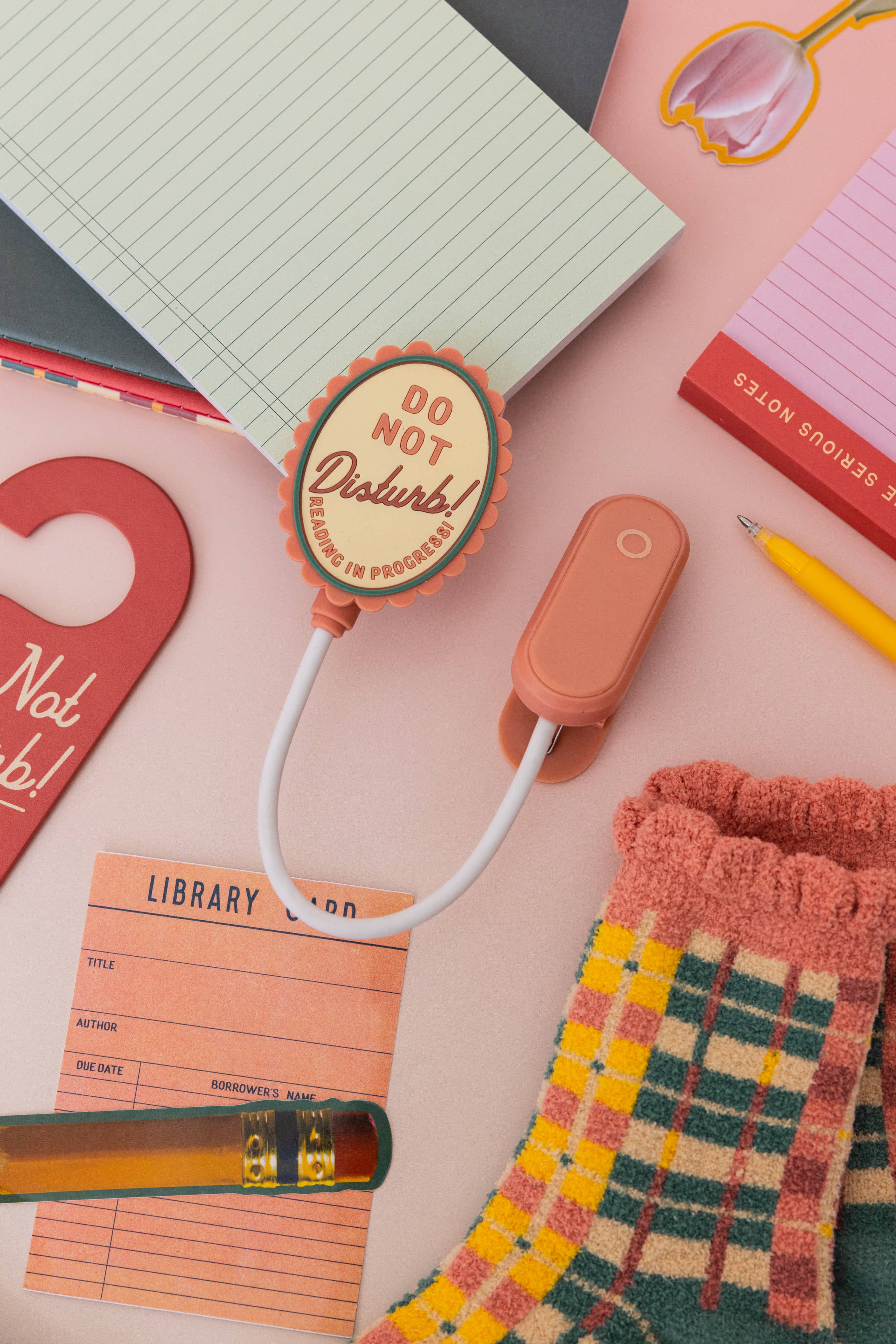 Book Light Do Not Disturb - compact clip-on LED reading light with adjustable neck and warm glow.
