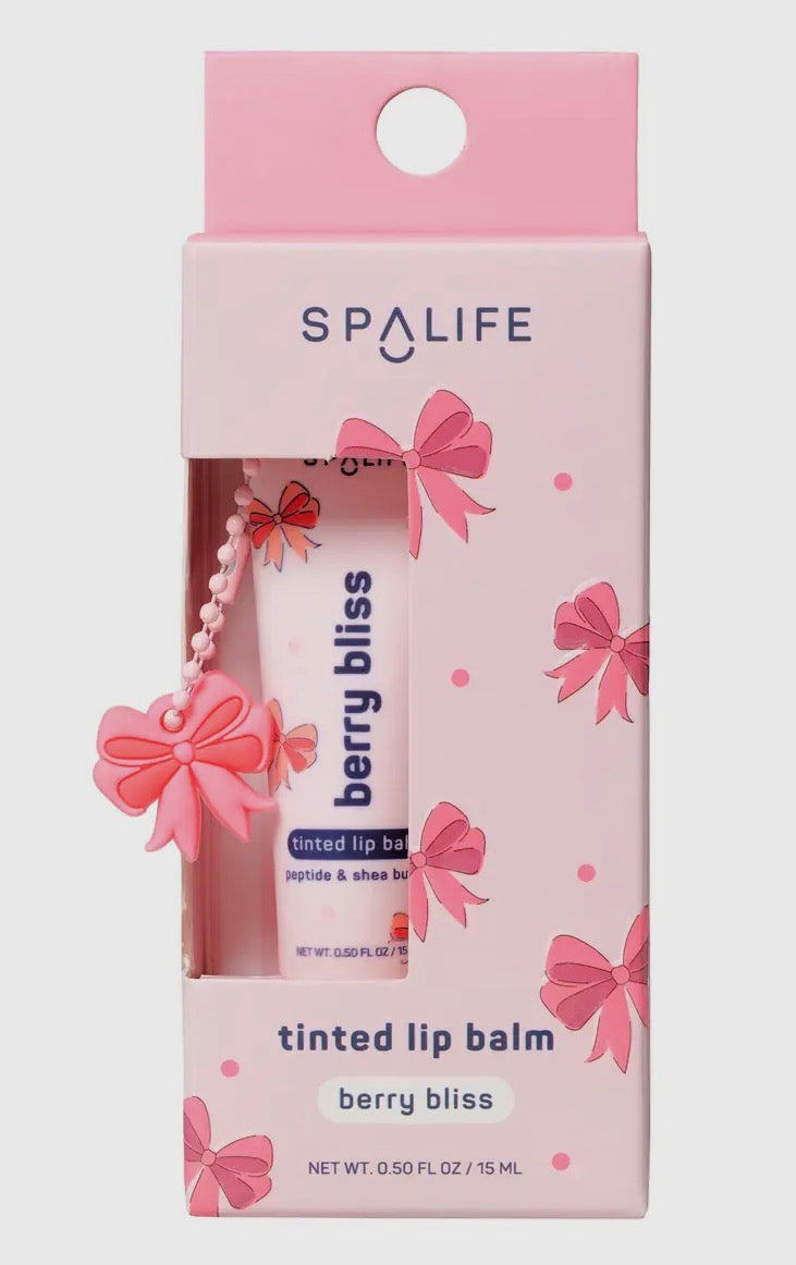 SpaLife berry bliss tinted lip balm packaging with pink bows and a white background