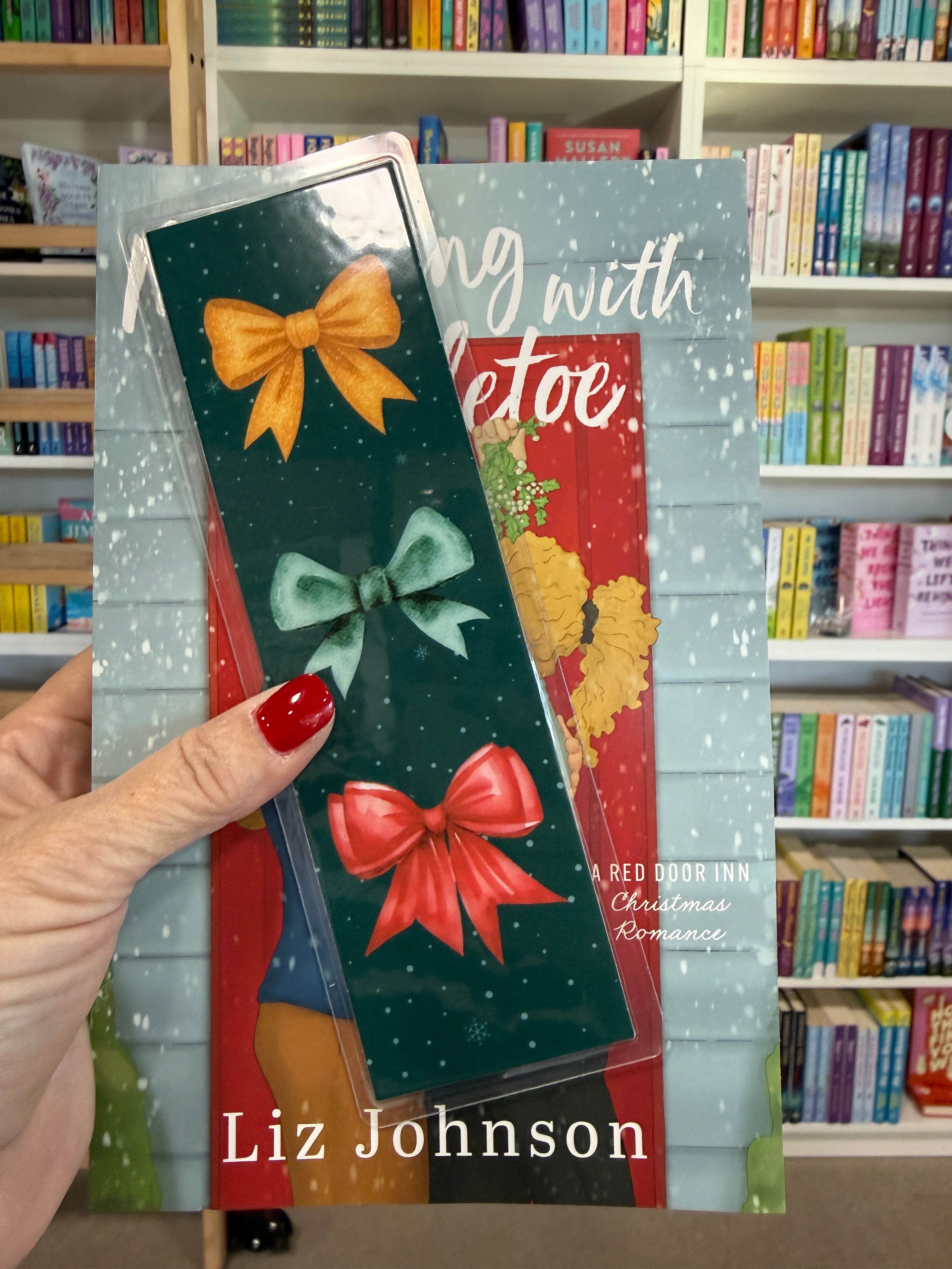 Handmade Christmas Bows Bookmark in festive red and green, perfect for holiday reading gifts