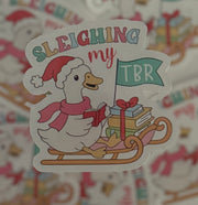 Sleighing My TBR Sticker, vibrant red holiday-themed, waterproof vinyl for book lovers, 3x3 inches