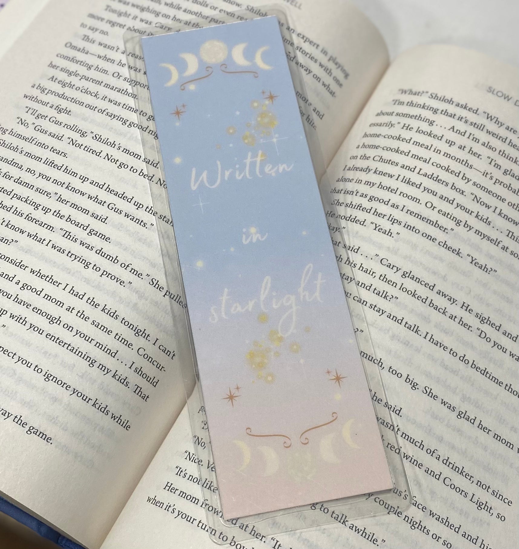Handcrafted Written in Starlight Bookmark in shimmering gold with celestial designs, perfect for book lovers