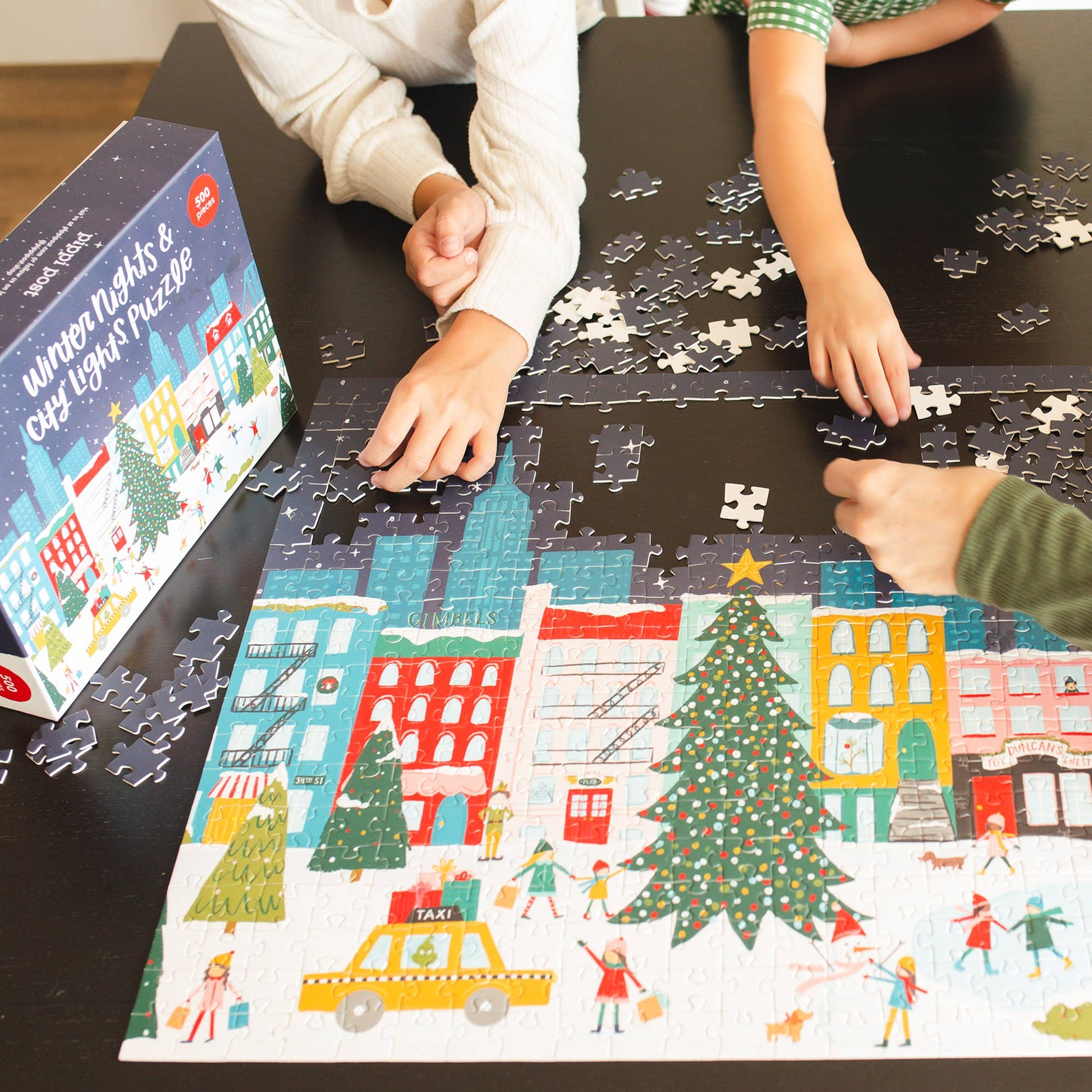 500 Piece Jigsaw Puzzle Winter Nights & City Lights, vibrant cityscape, challenging family activity