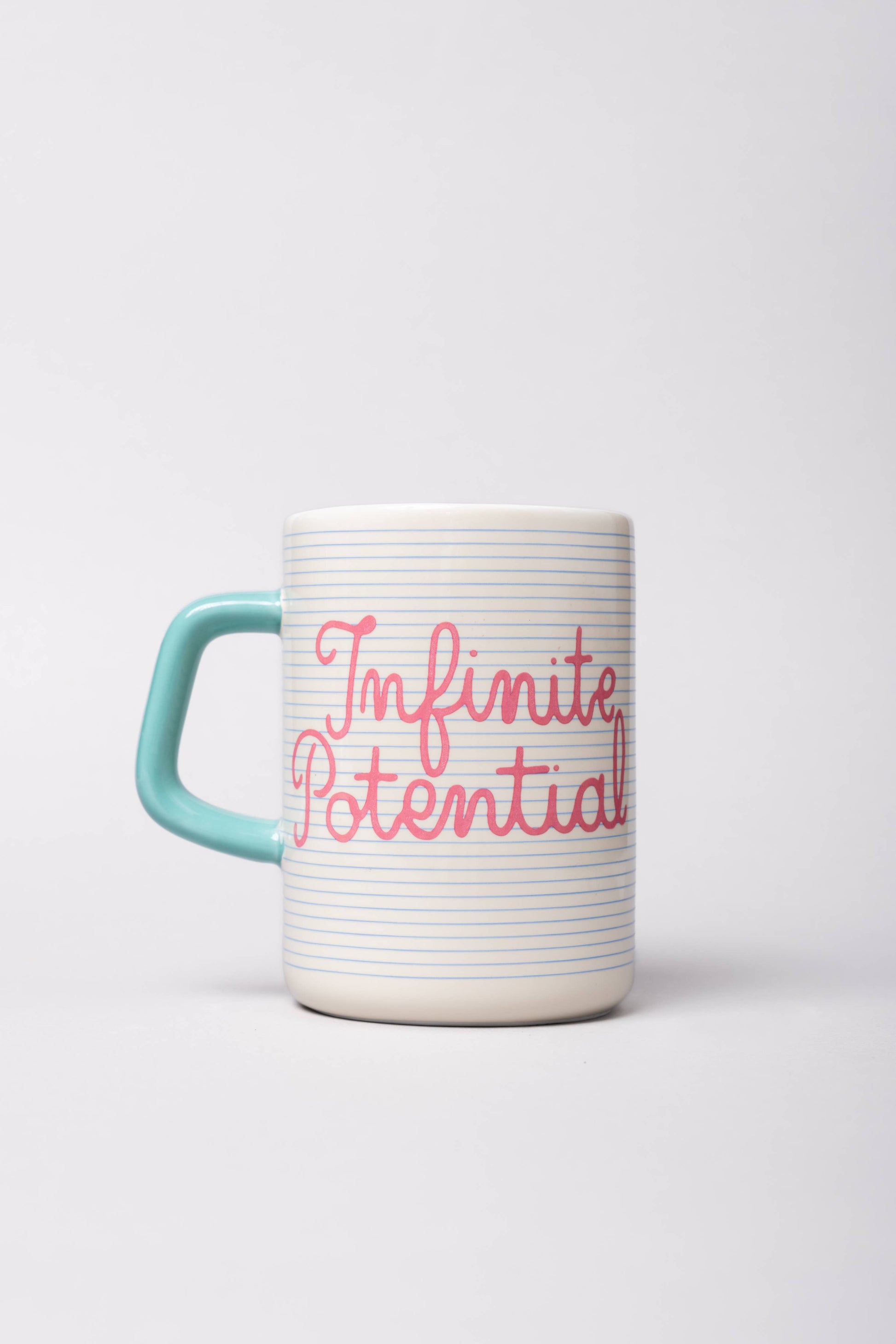 Ceramic mug featuring Infinite Potential design, perfect for coffee or tea lovers.