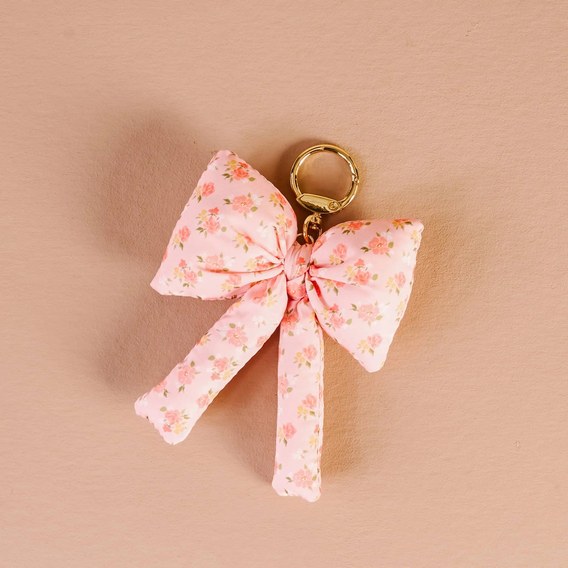 Peachy Petals Puffy Bow Bag Charm in soft pink, floral design, luxury accessory for handbags & purses, perfect gift idea.