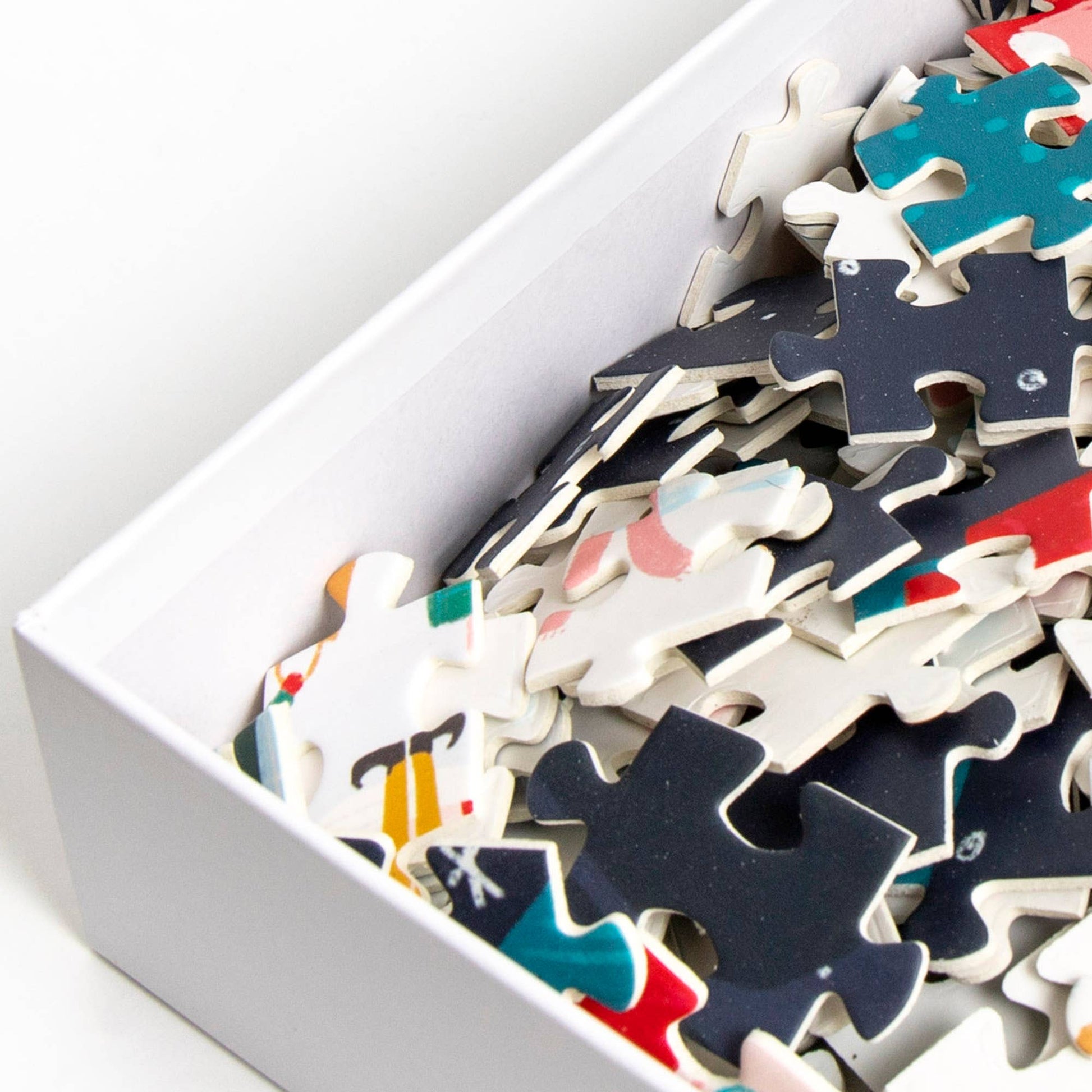 500 Piece Jigsaw Puzzle "Winter Nights & City Lights" featuring vibrant cityscape, perfect for puzzle enthusiasts