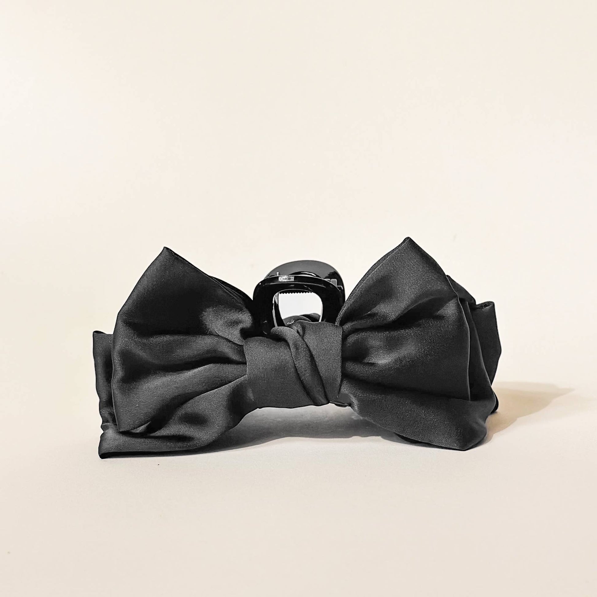 Black Satin Bow Claw Clip for elegant hairstyles, durable material, perfect for thick hair, stylish accessory