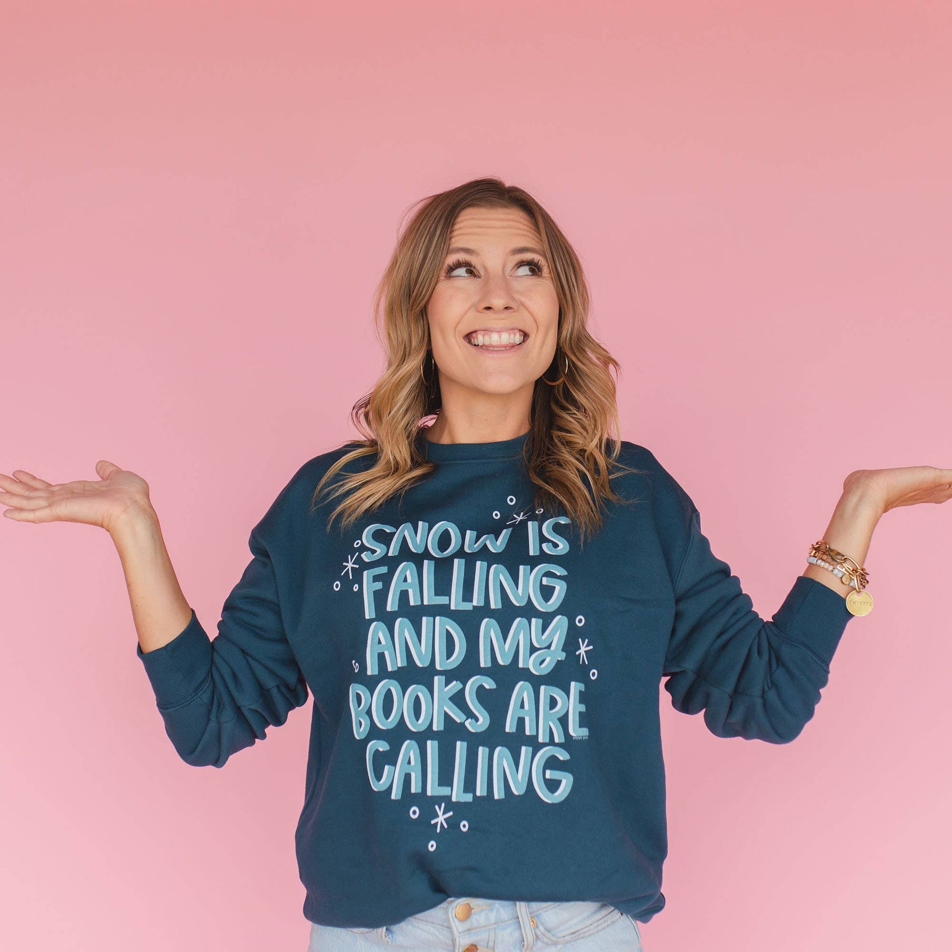 Buy now: Snow is Falling Sweatshirt in cozy white cotton, winter-themed graphic design, unisex medium fit