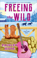 Romance novel "Freeing the Wild: A Silver Pines Novel" cover featuring a scenic forest backdrop and embracing couple